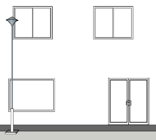 Sideview of an Outdoor Luminaire at the Multifamily Building Site Sideview of an Outdoor Luminaire at the Multifamily Building Site