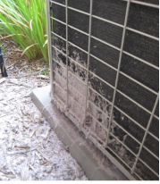 Part 1 of 2 figures- Figure 1 showing noncompliant condensing unit clearance from a dryer vent